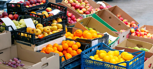 Boxes with fruit on the market on the street