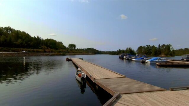 Walking on a dock in Temagami on a summer day