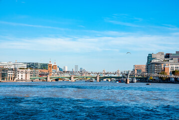 Fototapeta premium River Thames in London with beautiful scenery around on a warm summer day. Beautiful London view.