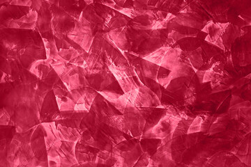 Beautiful red texture. Old stone macro, can be also used as background. Demonstrating Viva Magenta - trendy color of the year 2023