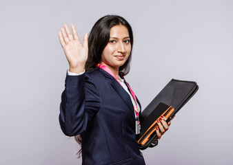 office female colleague send off, isolated on a grey studio back