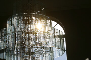 Glass chandelier with light coming through