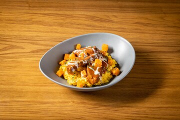 Butternut Squash with Braised Beef Cheek Risotto served in dish isolated on table top view of thai food