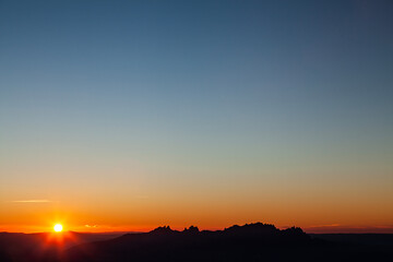 sunset at the top of the mountains with the front sound, spectacular colors