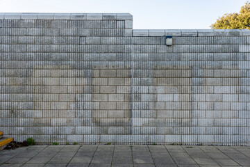 Concrete textured wall and paving stones, outside