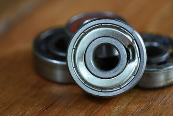 damaged ball bearing on the  wood table .