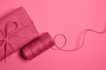 Packing order in Color 2023 viva magenta. Demonstrating color of 2023 year viva magenta. using recycling material