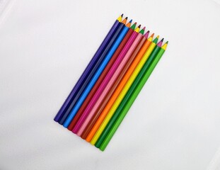 Color pencils on white in diagonal composition