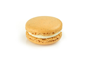 Single brown macaroon with white filling cream isolated on white background. French macaron delicacy