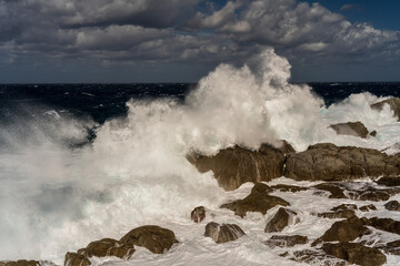 The stormy sea meets the shore