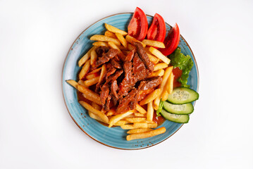 potatoes with meat and fresh tomatoes and cucumbers on a white background