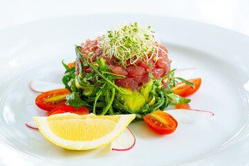 Steak Tartare,Plate with tasty beef tartare on white background