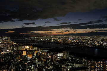Fototapeta na wymiar Japanese tourist destinations in 2022 Night view of Osaka