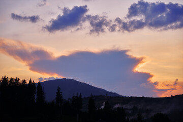 Beautiful mountains landscape with sunset sky. Carpathians, Ukraine.