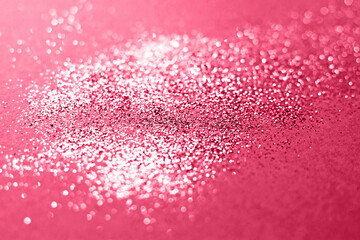 Magenta glitter. Blurry magenta glitter texture. Sequin texture. Color of 2023.