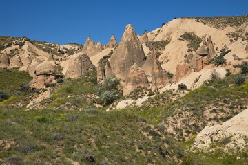 Fototapeta na wymiar Rock formation in Imaginary Valley at the road Ürgüp Yolu,Cappadocia,Nevsehir Province,Turkey 