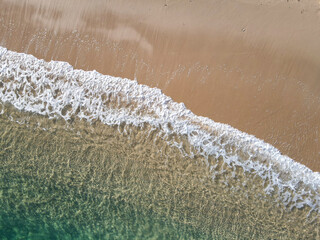 wave breaking on the beachRena di Ponente , sea and beach of Capo Testa, sea and rock of Rena di Levante, Sardinia, Italy