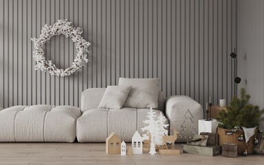 Modern minimalistic stylish living room with white sofa, decor and Christmas wreath with white berries on the wall.Decorative slatted gray panel on the wall. New Year's eco decor on the floor