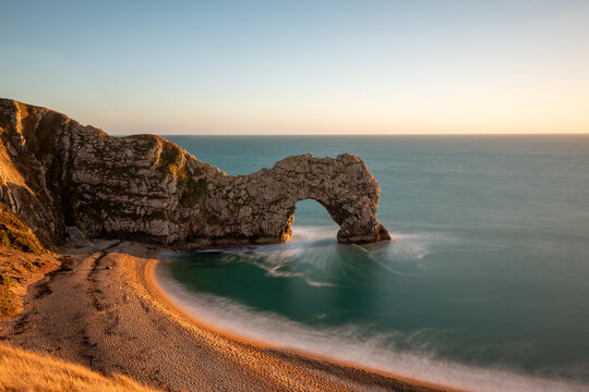 Long exposure of the calm sea at Durdle Door on the Jurassic Coast in Dorset