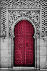 Arabic oriental styled door in Morocco. New 2023 trending PANTONE 18-1750 Viva Magenta colour