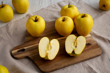 Raw Organic Golden Apples Ready to Eat, low angle view.