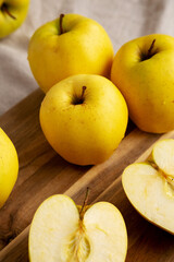 Raw Organic Golden Apples Ready to Eat, side view.