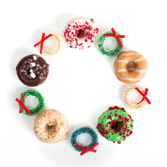 ring of christmas donuts on white background