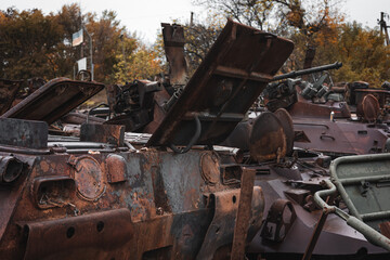 Plakat War in Ukraine, cemetery of Russian equipment, destroyed military equipment. Izyum city, Kharkiv region.