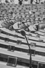 Microphone used by senators in the assembly in the Senate in Paris, France, with all the seats...