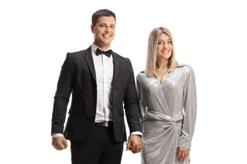 Elegant young couple holding hands
