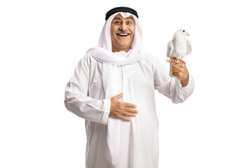 Arab man holding a white dove on his finger