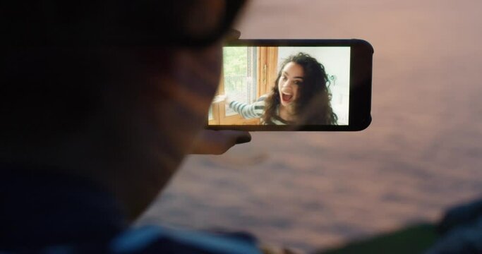 Woman, phone screen and video call in nature, beach and wave to friend, virtual communication and talking outdoor. Video conference, mobile smartphone and women friends talk during sunset at ocean