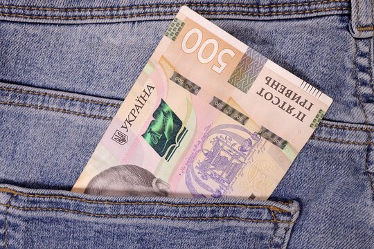 Ukrainian money Uah hrn gryvna hryvnia in pocket. The concept of savings, investment
