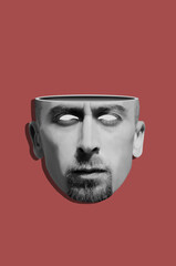 Digital collage with head of a young bearded man