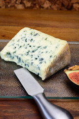 Cheese collection, piece of French blue cheese auvergne or fourme d'ambert