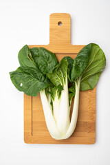 Young organic white bok choy or bak choi Chinese cabbage ready to cook