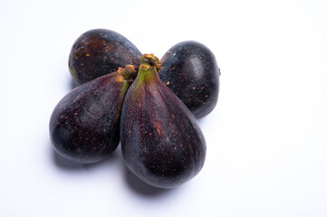 Fresh ripe organic figs fruits ready to eat close up isolated on white background
