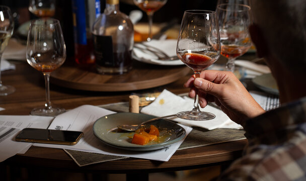 Wine workshop during dinner time in a restaurant, Braga, Portugal.