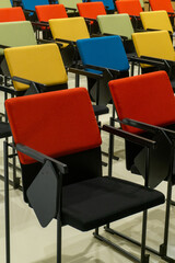 Rows of colourful seats in the hall