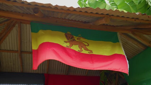 Rastafarian Union of Jamaica.  The flags of Euphiopia are blown away by the wind. Haile Selassie.