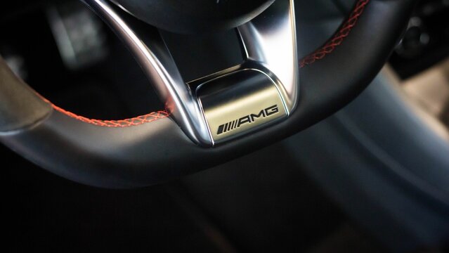 Closeup shot of a steering wheel of a Mercedes-Benz AMG CLA 45