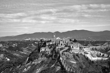 concrete footbridge to the historic stone town of Bagnoregio at the top of the rock