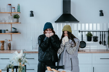 Warmly dressed women are upset with the heating turned off