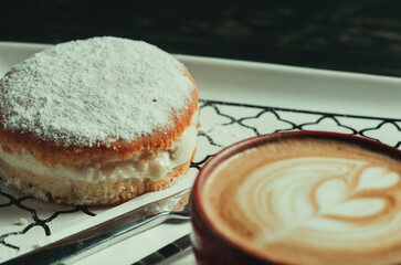  donuts with cafe latte close up