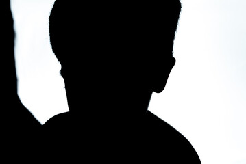 Cute adorable boy in the studio - silhouette