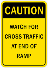 Garage sign and label caution watch for cross traffic at end of ramp