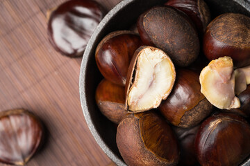 Fresh chestnuts on a monochrome background