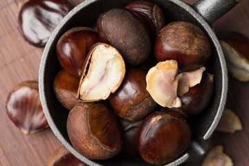 Fresh chestnuts on a monochrome background