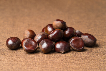 Fresh chestnuts on a monochrome background