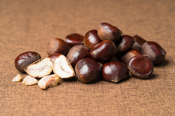 Fresh chestnuts on a monochrome background